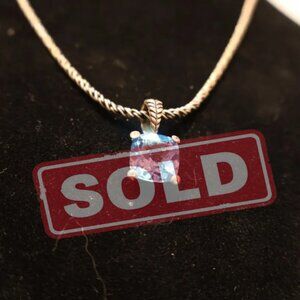 Perfect necklace with a beautiful blue Topaz and white Sapphires